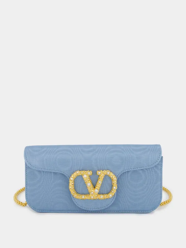 Blue Locň Moiré Fabric Clutch with Jewel Logo sold by Fashion Clinic