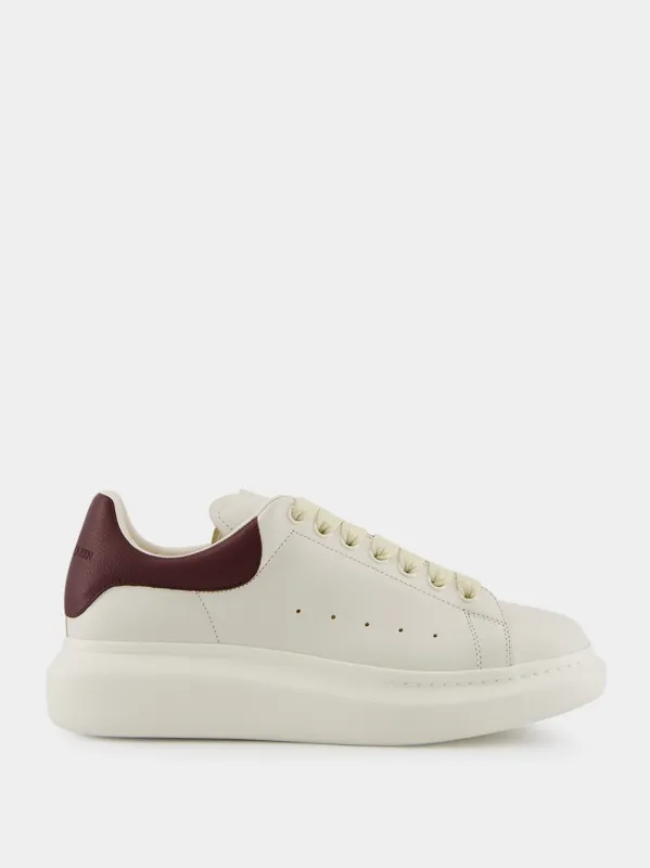 Off White and Bordeaux Oversized Sneakers sold by Fashion Clinic