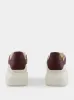 Off White and Bordeaux Oversized Sneakers sold by Fashion Clinic