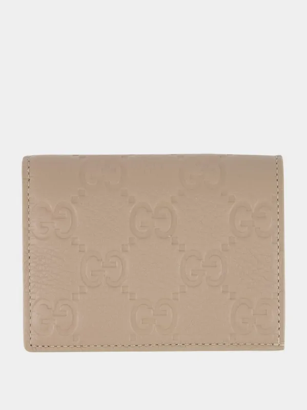 Taupe GG Emblem Mini Wallet sold by Fashion Clinic