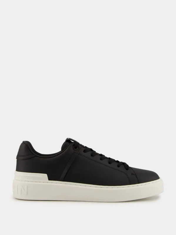 Black and White B-Court Calfskin Trainers sold by Fashion Clinic