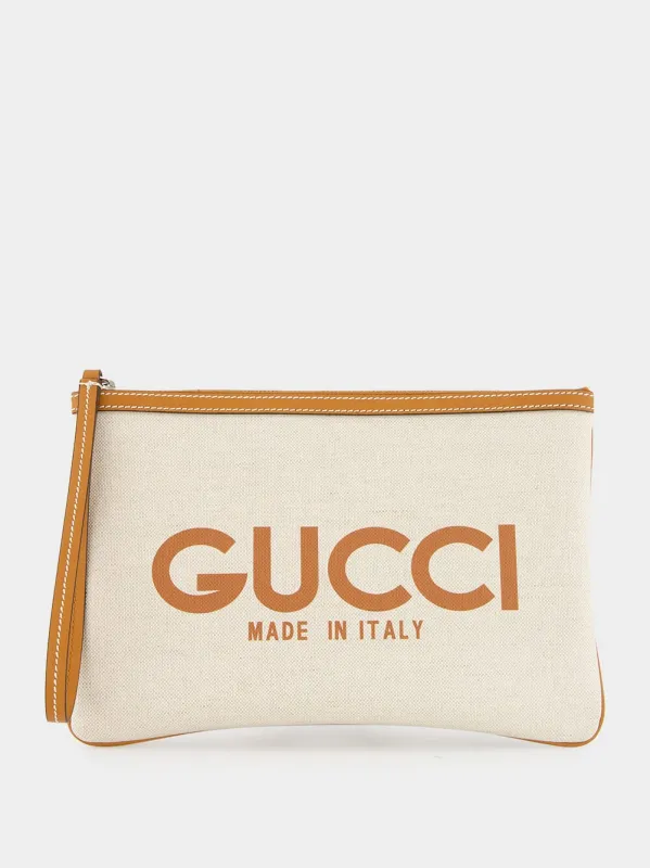 Beige Gucci Print Clutch sold by Fashion Clinic