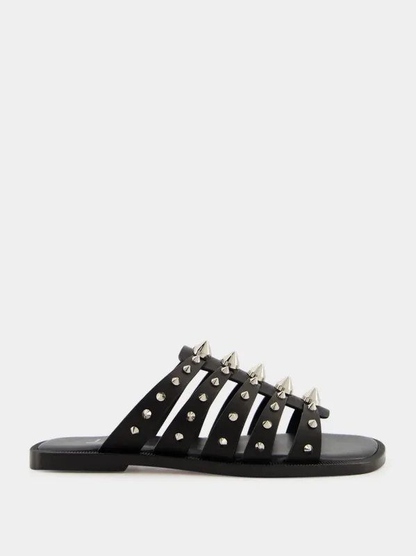 Charja Flat Mules with Studs in Black Calf sold by Fashion Clinic