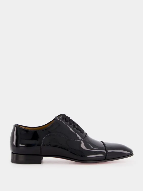 Black Greggo Patent Oxfords sold by Fashion Clinic