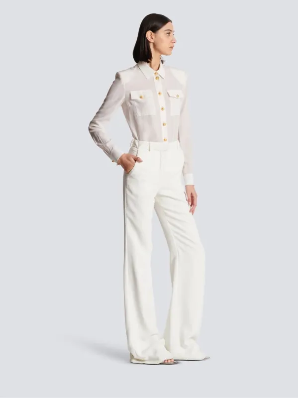 White Crepe Flared Trousers sold by Fashion Clinic