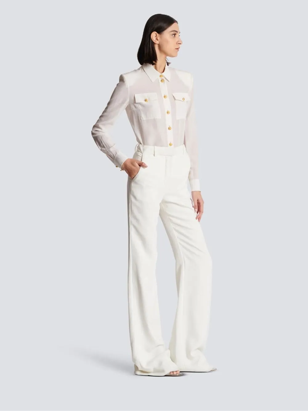 White Crepe Flared Trousers sold by Fashion Clinic