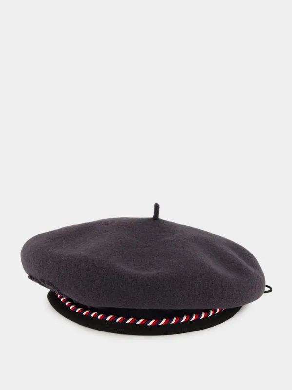 Charcoal Script Beret with Red and Blue Piping sold by Fashion Clinic