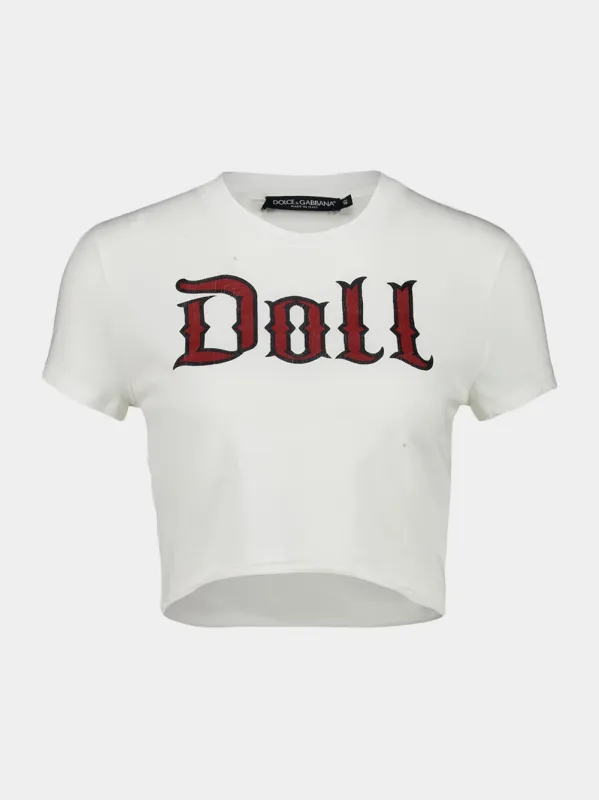 White Cropped Jersey T-Shirt with "Doll" Print sold by Fashion Clinic