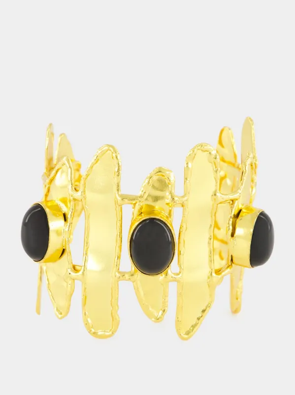 Gold Brutalist Cuff with Black Onyx sold by Fashion Clinic
