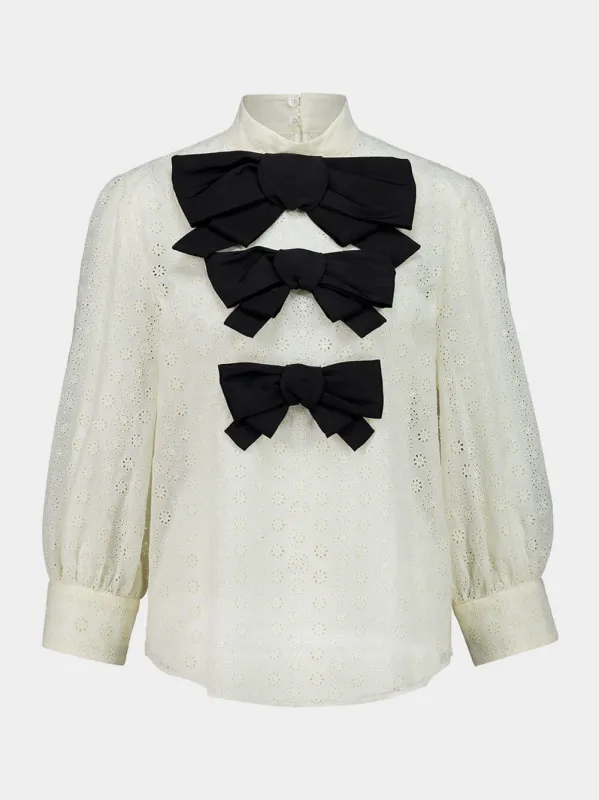 Ivory Cotton Blouse with Black Bows sold by Fashion Clinic