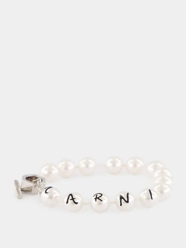 White Pearl Logo Bracelet sold by Fashion Clinic