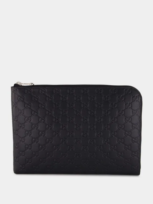 Black GG Leather Monogram Pouch sold by Fashion Clinic