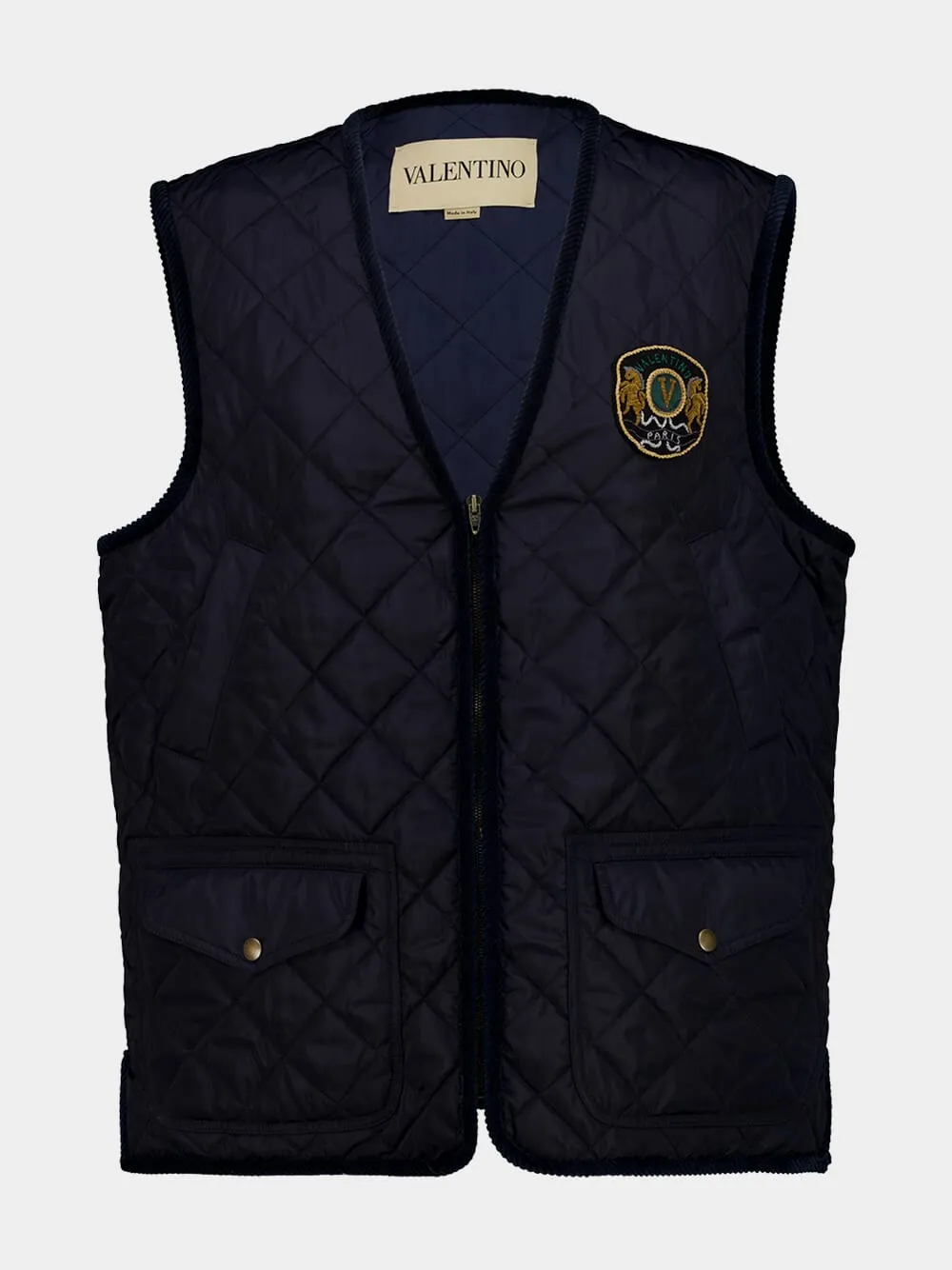 Navy Quilted Vest with Embroidered Patch sold by Fashion Clinic