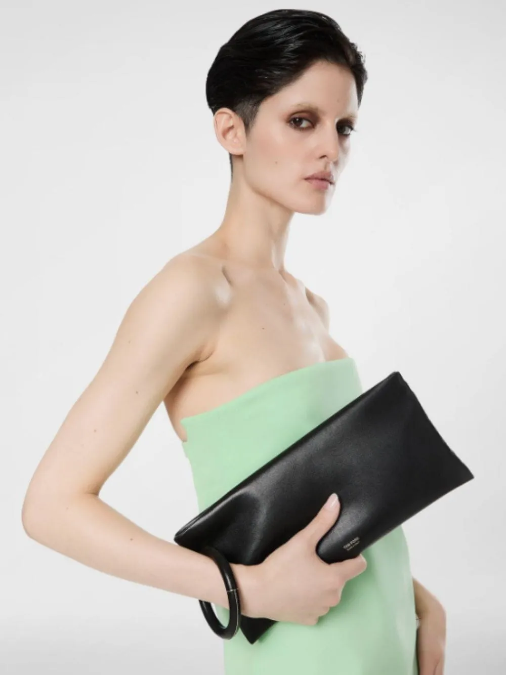 Black Nappa Aura Clutch sold by Fashion Clinic