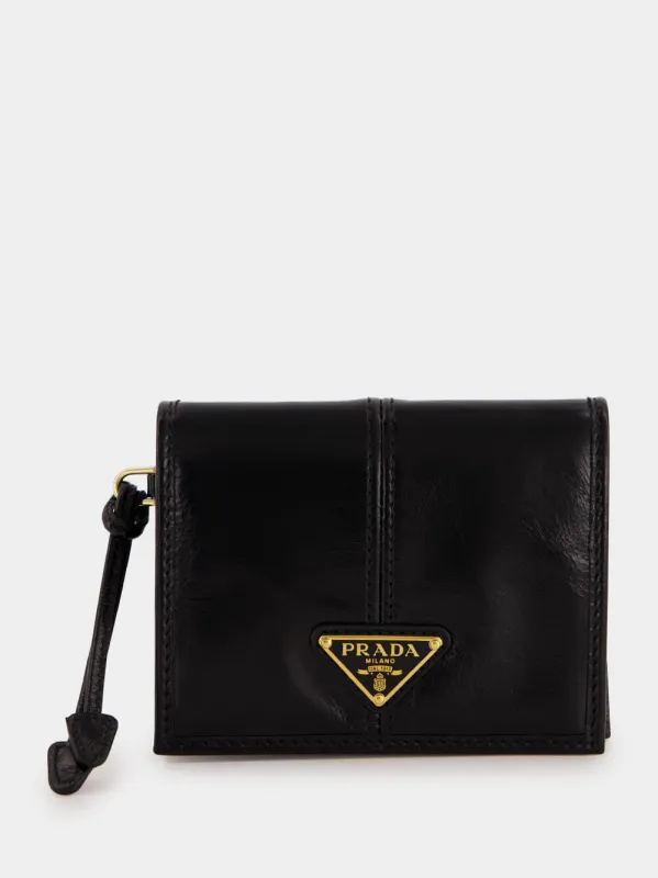 Black Patent Leather Triangular Logo Wallet made by Prada