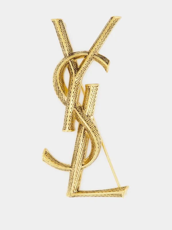 Cassandre Snake Brooch in Aged Brass sold by Fashion Clinic