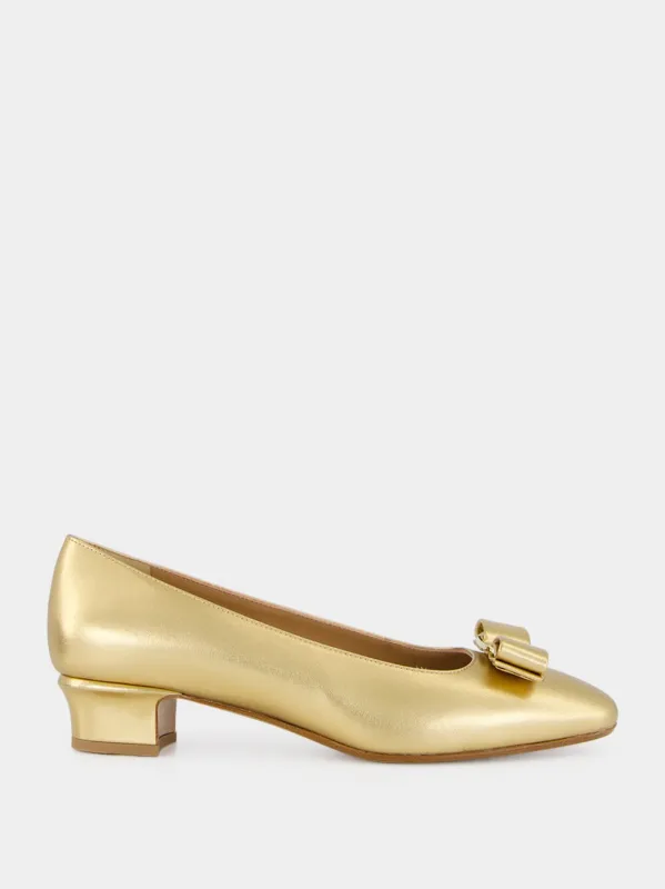 Gold Laminated Nappa Vara Bow Pumps sold by Fashion Clinic