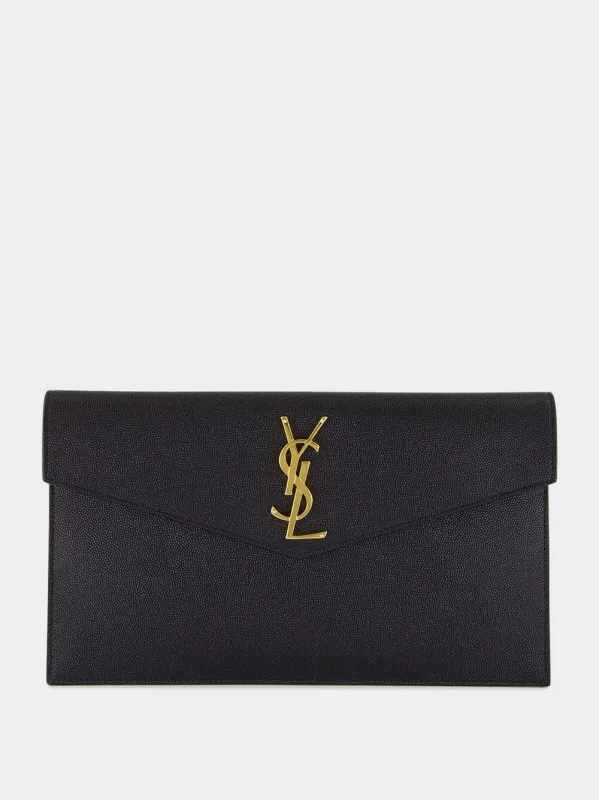 Black Uptown Grain Leather Clutch sold by Fashion Clinic