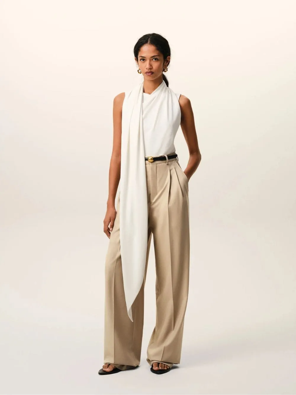 Beige High-Waist Wide Wool Trousers sold by Fashion Clinic