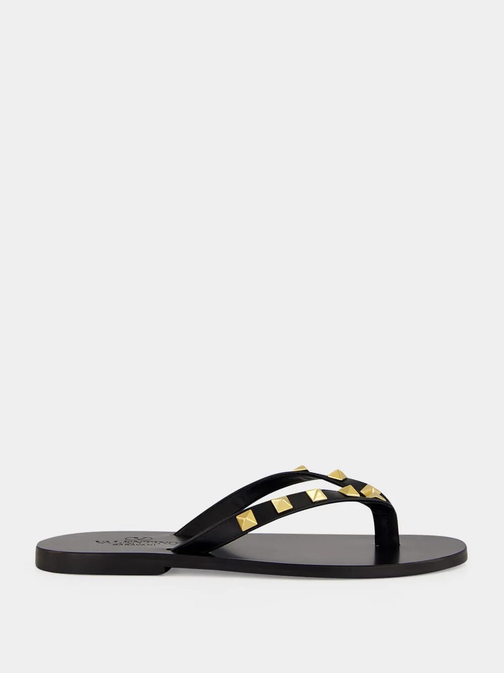 Black Rockstud Leather Slides sold by Fashion Clinic