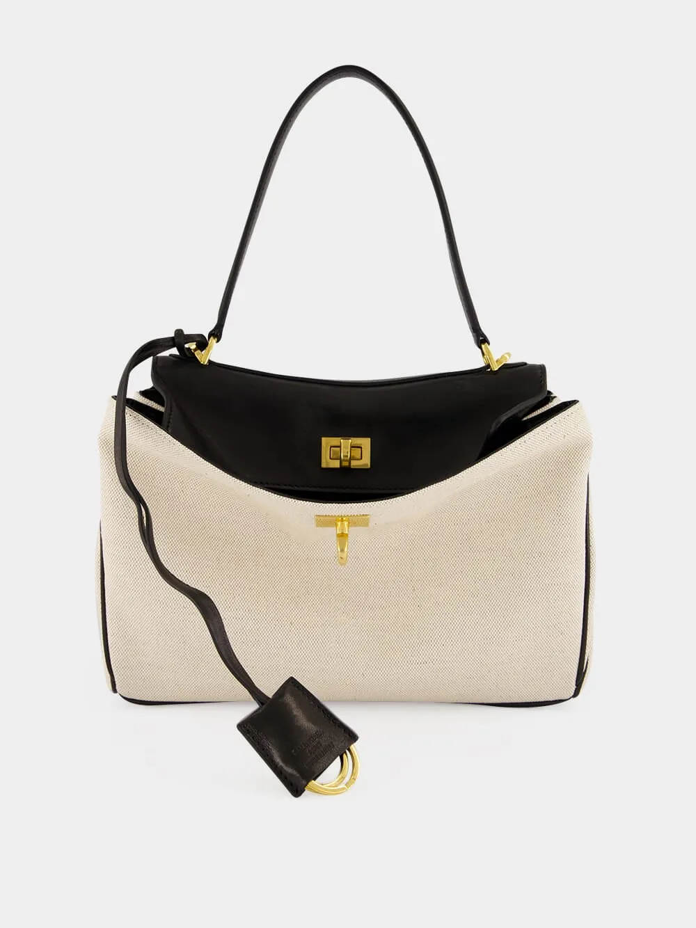 Beige and Black Rodeo Small Handbag sold by Fashion Clinic