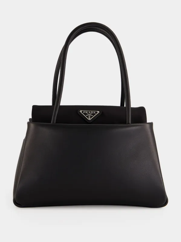 Black Leather Top Handle Bag made by Prada