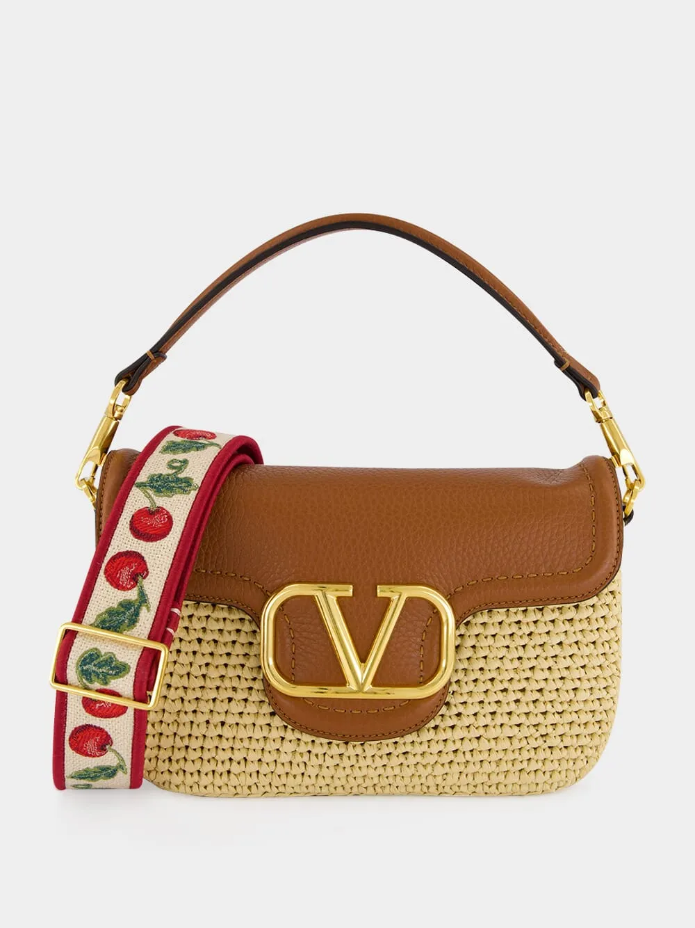 Natural Raffia and Saddle Brown Leather Shoulder Bag sold by Fashion Clinic