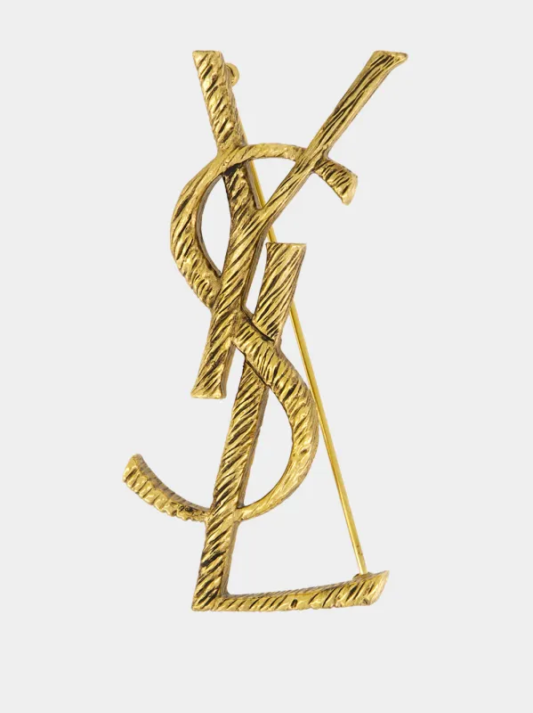 Gold Monogram Textured Brooch made by Yves Saint Laurent