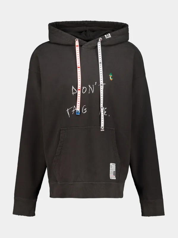 Black Don't Tag Me Printed Hooded Sweatshirt made by Maison MIHARA YASUHIRO