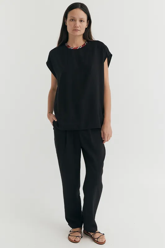 SLEEVELESS SIDE ZIP TOP sold by EMOTE