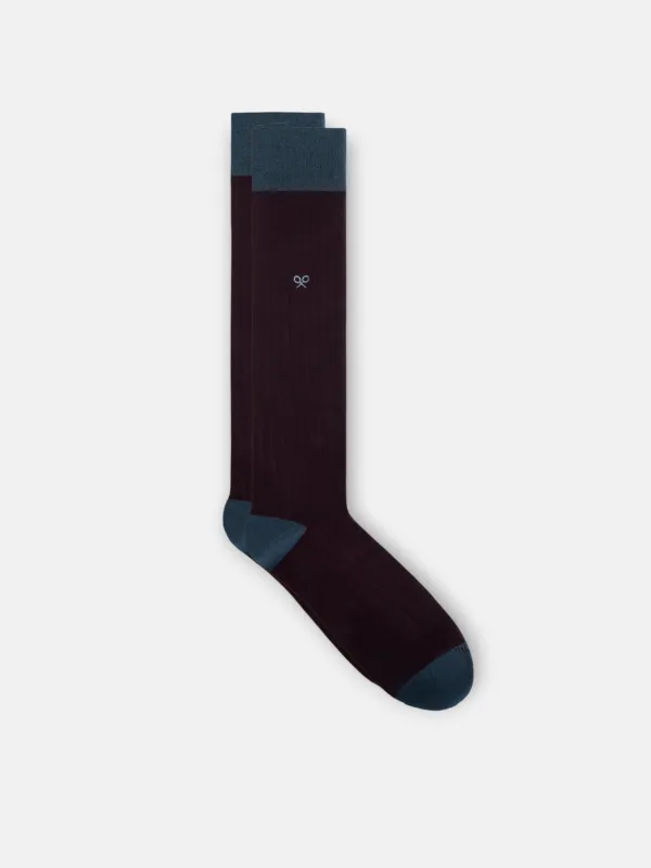 Burgundy ribbed knee-high sock sold by Silbon