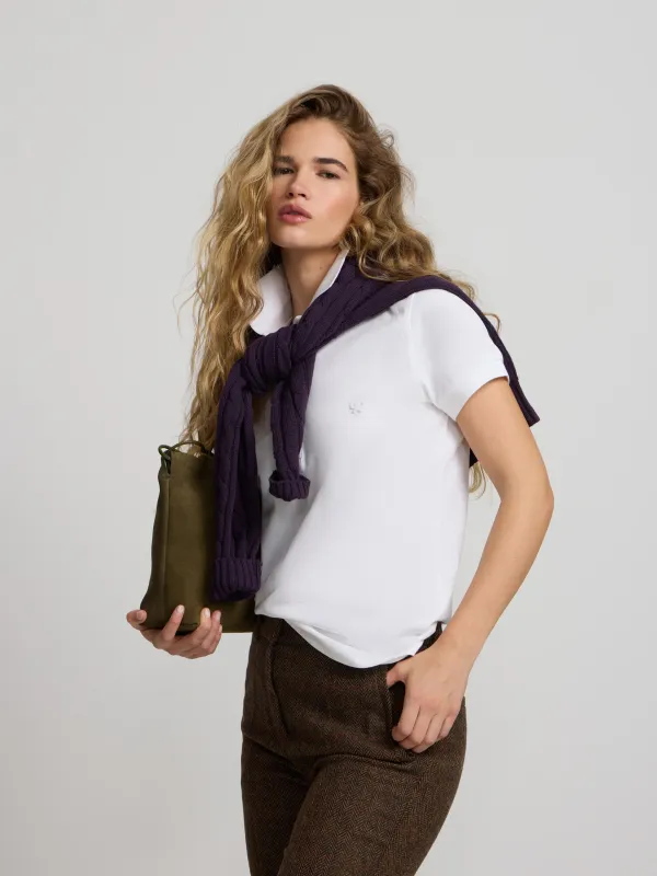 classic white women's polo shirt sold by Silbon