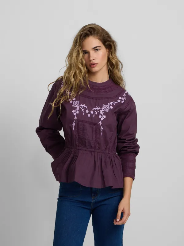 Purple embroidered blouse sold by Silbon