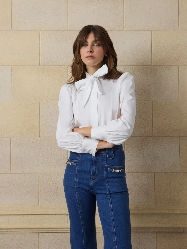 Unique white bow-neck blouse sold by Silbon