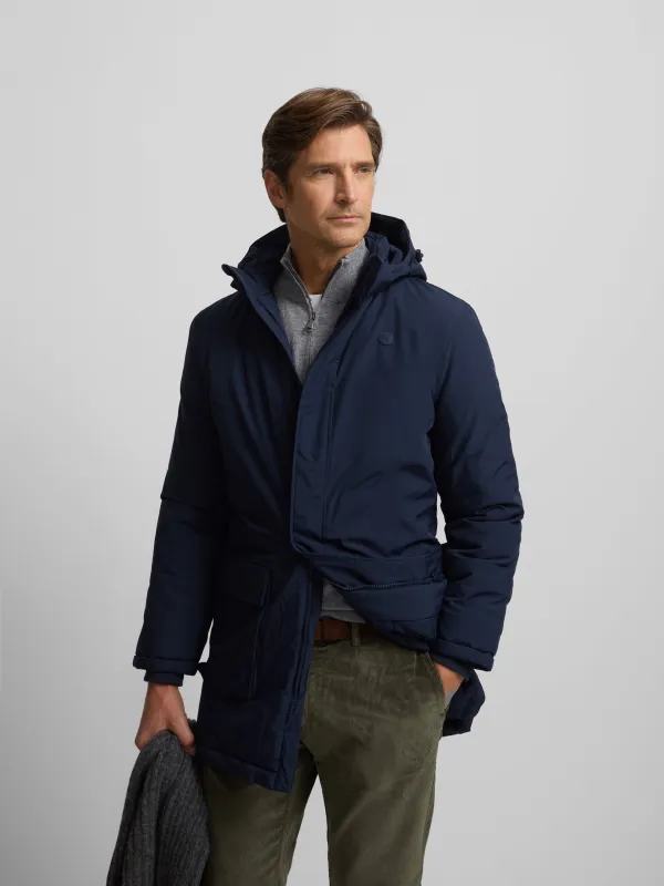 Long technical coat with navy blue hood sold by Silbon