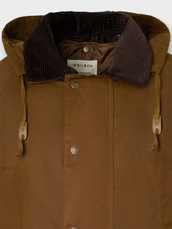 Classic mustard waxed coat sold by Silbon