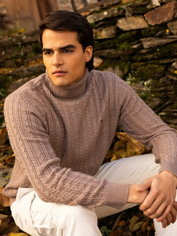 Light brown cable knit turtleneck sweater sold by Silbon