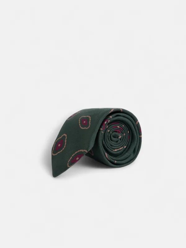 Green geometric irregular motif tie sold by Silbon