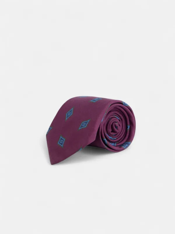 Burgundy rhombus motif tie sold by Silbon
