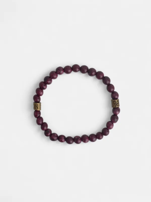 Burgundy round stone bracelet sold by Silbon