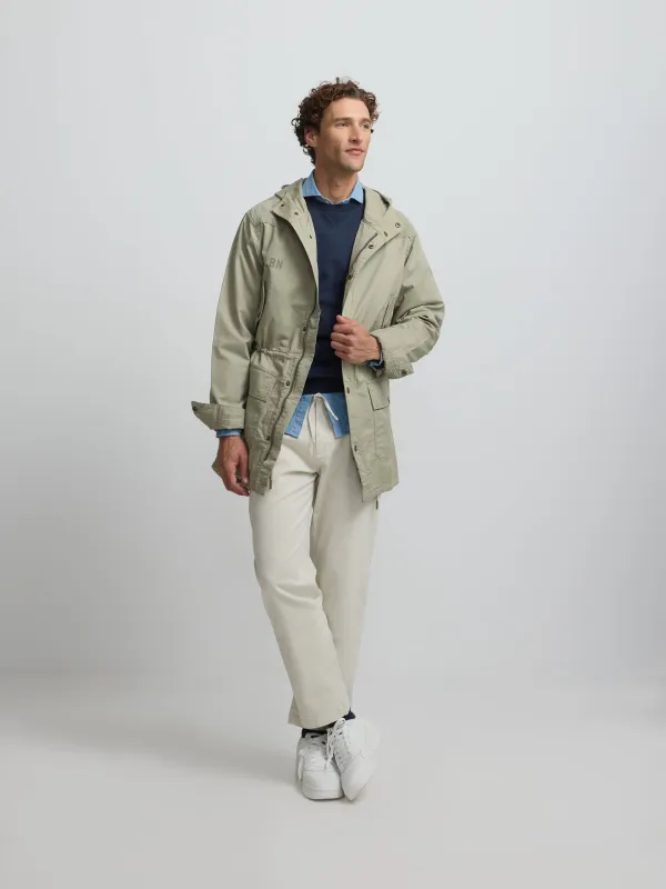 Green garment dye parka sold by Silbon