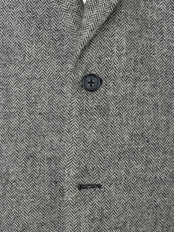 Grey herringbone blazer sold by Silbon