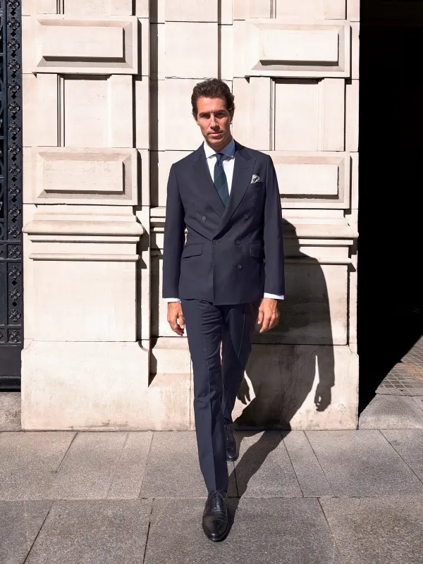 Navy stretch double-breasted suit trousers sold by Silbon