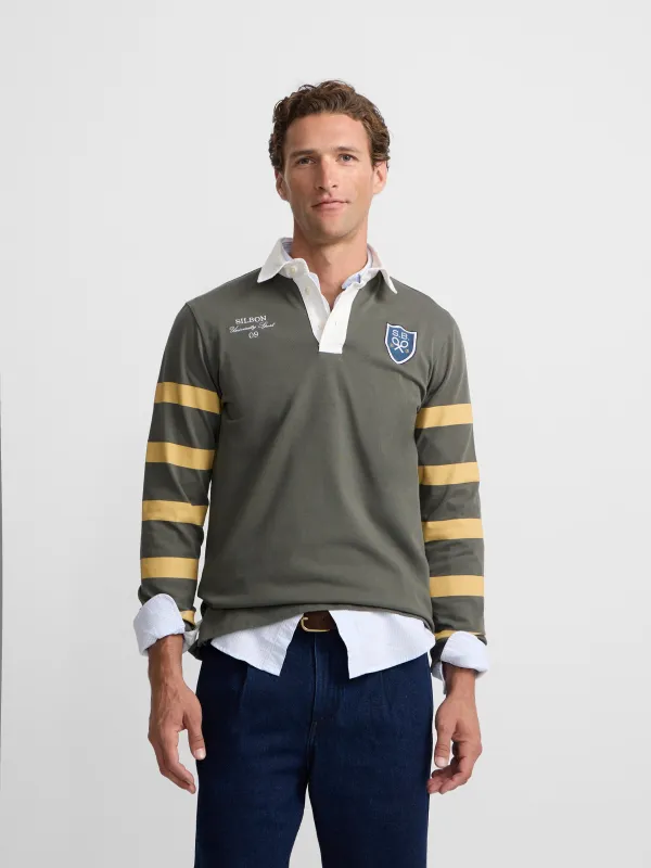 Classic rugby polo shirt with green shield sold by Silbon