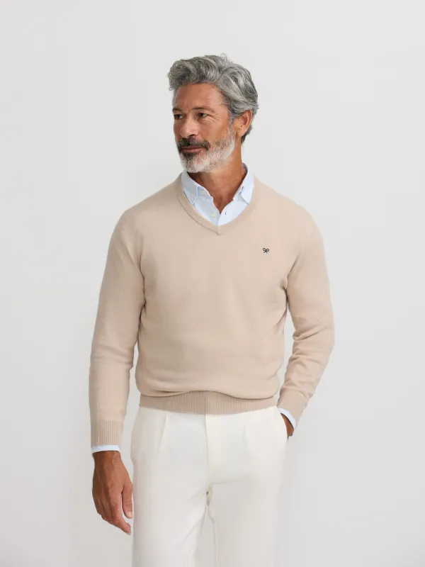 Classic beige V-neck sweater sold by Silbon