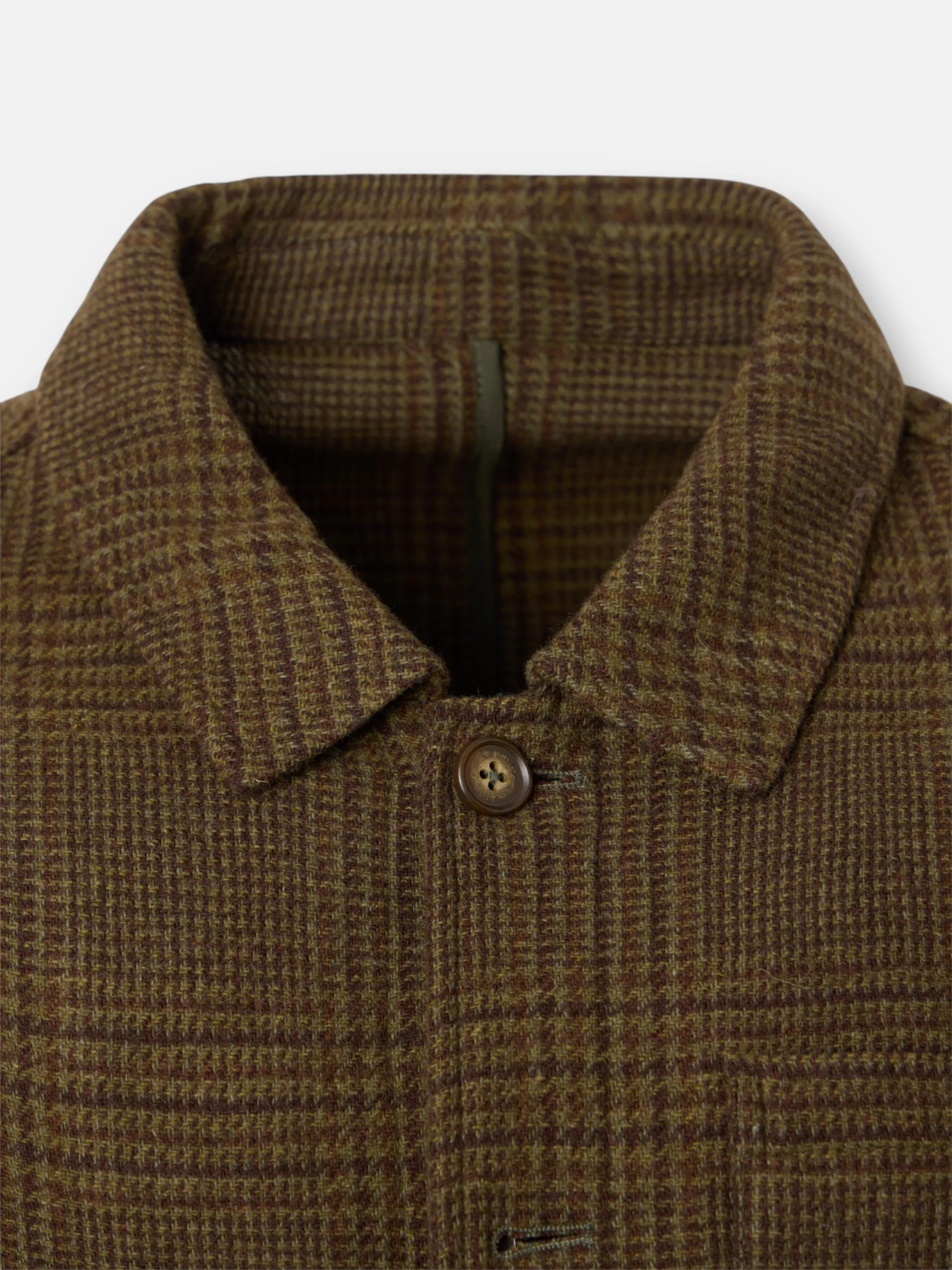 Prince of Wales jacket with brown pockets sold by Silbon
