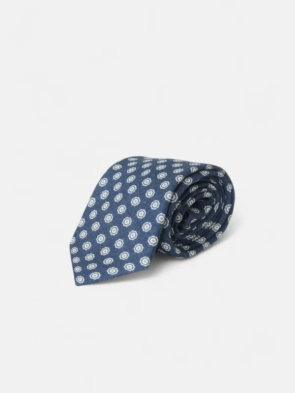 Navy blue flower motif tie sold by Silbon