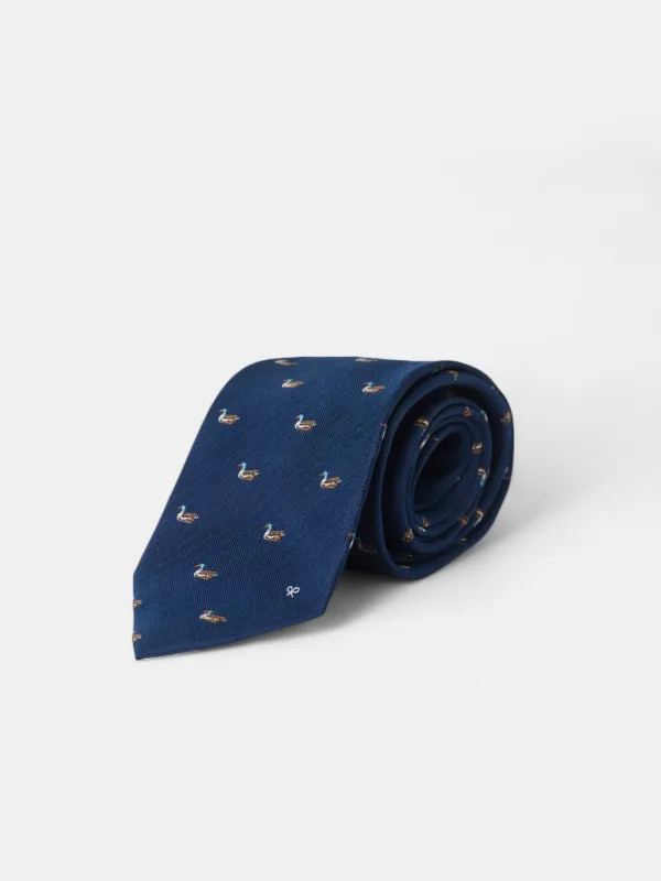 Navy blue duck racket motif tie sold by Silbon