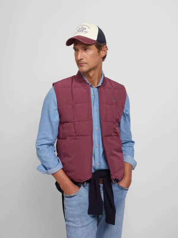 Burgundy checked technical vest sold by Silbon