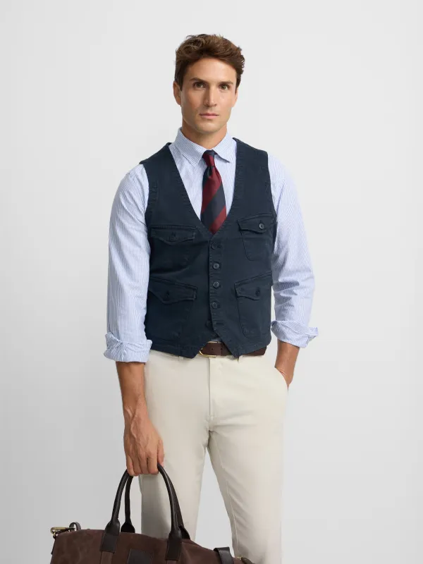 Navy blue multi-pocket vest sold by Silbon